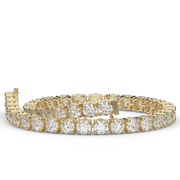 10 Carat Yellow Gold Round Shape Diamond Tennis Bracelet With Prong Setting.